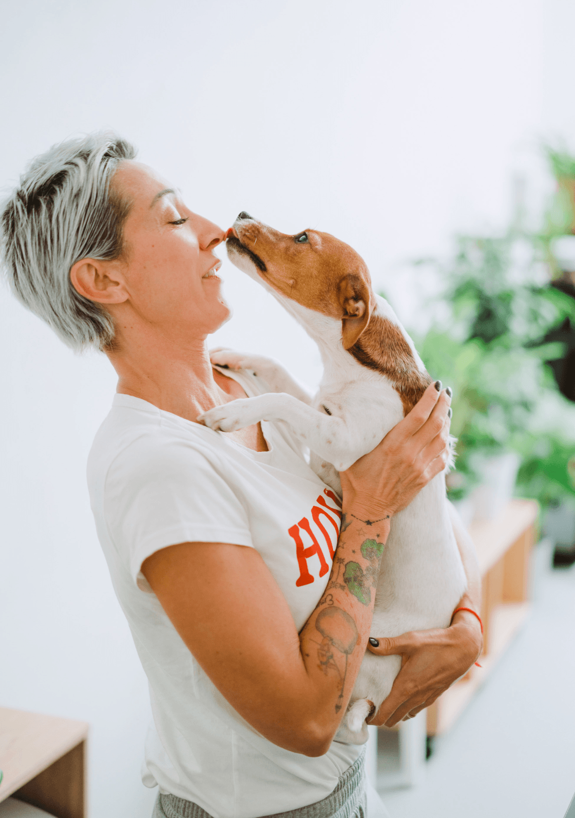 Woman holding dog